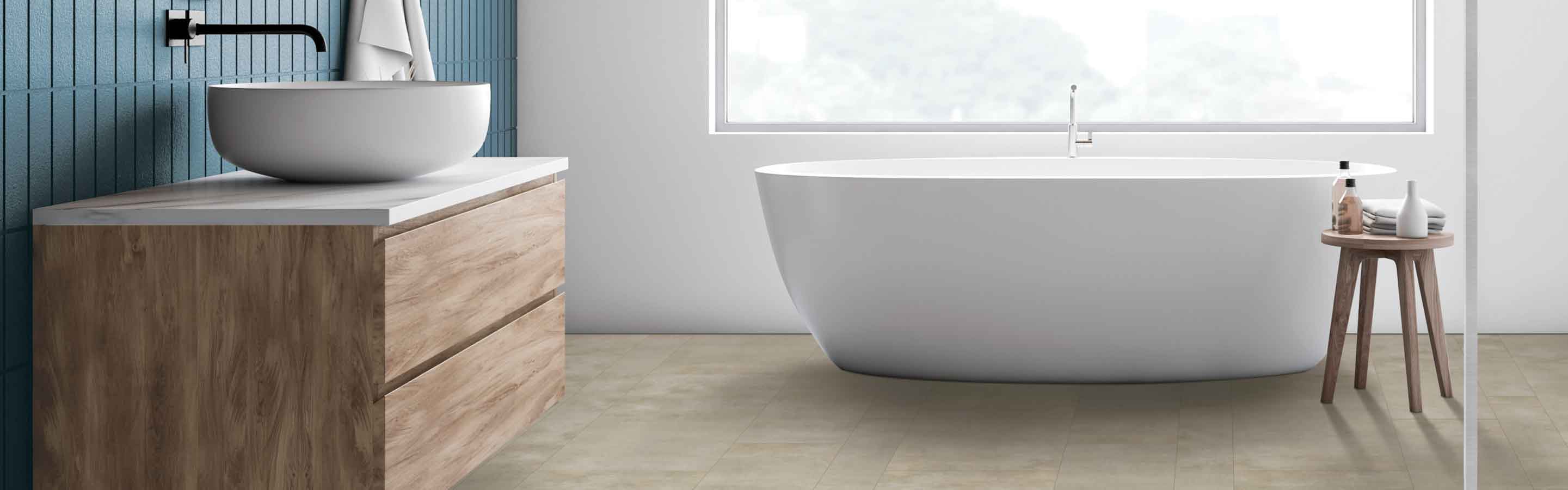 stone look vinyl in open, airy bathroom with blue accent wall, wood rafters, and deep soak tub