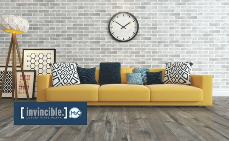 Invincible H2O flooring with yellow sofa